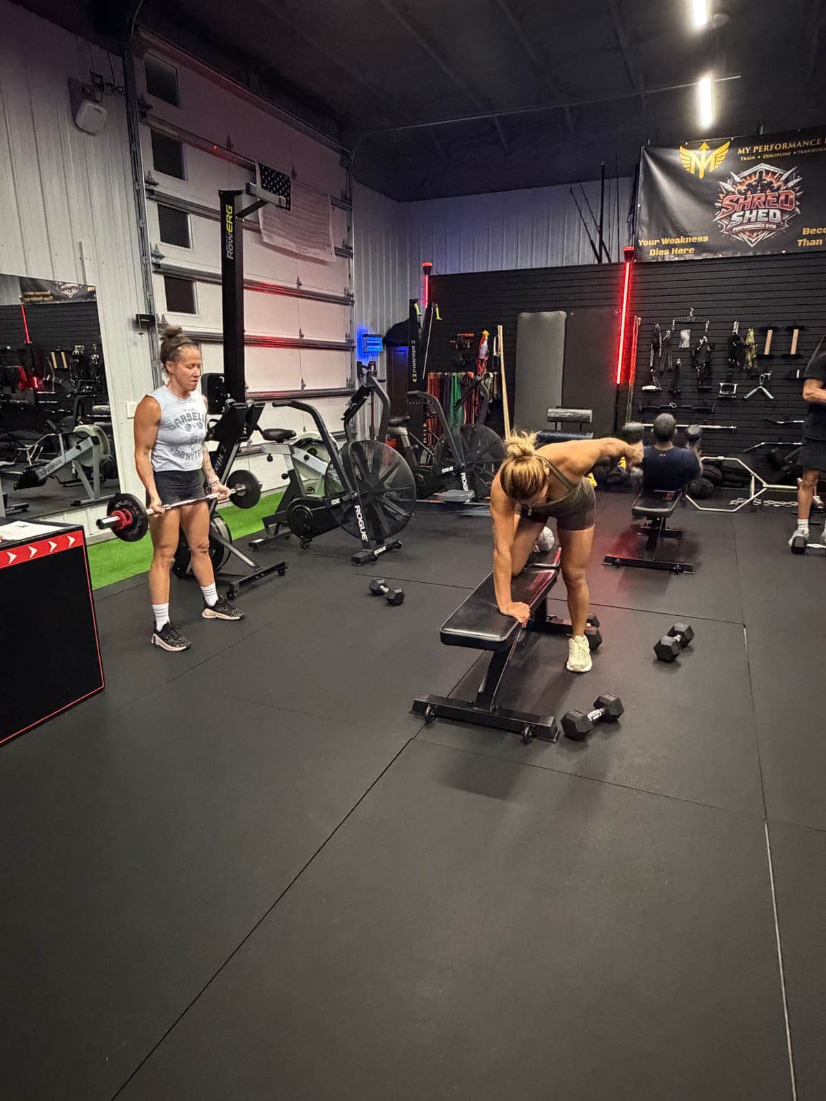 Coaching a client through a dumbbell row