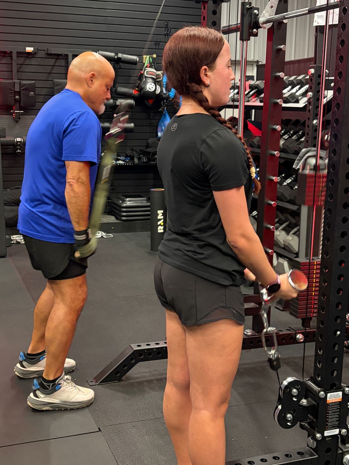 Coach working one-on-one with a client at The Shred Shed